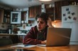 © Jorge Ferreiro - A Student preparing for exam sitting at the kitchen