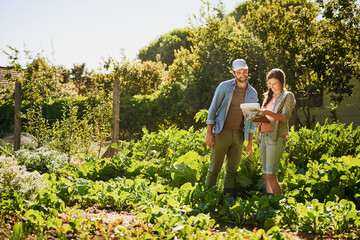 Agriculture, farmer and partner in discussion with document for plant growth or harvest vegetables in nature. Man, woman and happy couple at garden farm together for planning food production at field