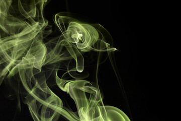 Wall Mural - close up of incense smoke abstract on black background