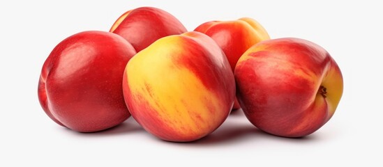 Ripe juicy nectarines white background