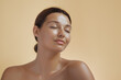 © Buyanskyy Production - Photo of Natural Beauty Woman with Radiant Tanned Skin and Closed Eyes
