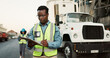 © peopleimages.com - Industrial, outdoor and black man with clipboard in shipping for inspection, inventory check or delivery schedule. Logistics, checklist and employee for distribution, supply chain or quality control