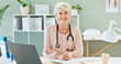 © HockleyMedia24/peopleimages.com - Mature doctor, woman and portrait in office with paperwork for healthcare prescription and medical results. Medicine, professional and writing health information for diagnosis, treatment and happy