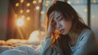 © ZAY WIN HTAI - An Asian woman feeling dizzy and unable to sleep