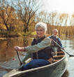 © ReadyAtTheEase/peopleimages.com - River, rowing and kayak with old couple, nature and retirement with happiness, love and vacation. Outdoor, lake and mature man with senior woman, support and smile with holiday, joy and weekend break