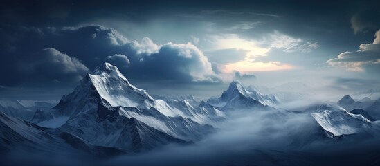Wall Mural - An aerial view of snow-capped mountains veiled by clouds under a dimly lit evening sky, with copy space image.