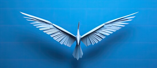 Wall Mural - Origami crane with copy space image on white backdrop.