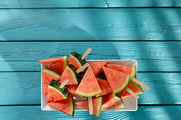 Wall Mural - Desk of free space and fresh watermelon on board. 