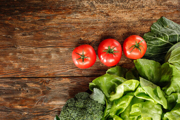 Poster - Desk of free space and fresh red tomatoes. 