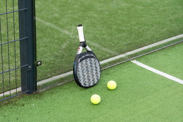 Paddle tennis racket and ball