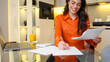© PeopleVideos - Young woman planning her finances