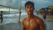 © QuietWord - handsome southeast Asian teenage male, playing volleyball at the beach
