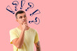 © Pixel-Shot - Thoughtful young man on pink background