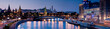 © Travel 'n' Lifestyle - View of illuminated city skyline with historic buildings and reflection on river, Khamovniki, Moscow, Russia.