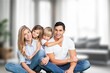 © BillionPhotos.com - Happy young Parents With child have fun at home