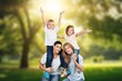 © BillionPhotos.com - Happy young family with child in nature together.