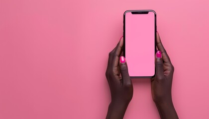 Black woman's hands holding smartphone with pink background and screen