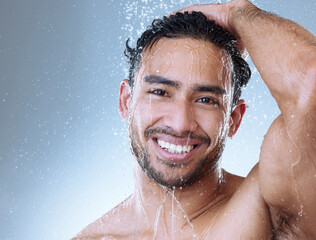 Poster - Shower, wash and portrait of man in studio with water drop for hygiene, grooming or skincare on white background. Body, cleaning and Asian model for natural treatment, wellness or morning routine