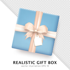Wall Mural - Template of 3d realistic blue gift box with beige silk bow and hanging tag with space for greeting text. Three dimensional present wrap package with crossed ribbon and white empty label. Top view