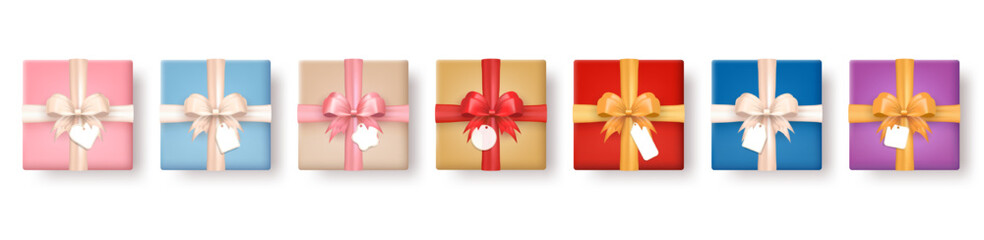 Wall Mural - Big set of 3d realistic colorful gift boxes wrapped in craft paper and tied with silk bow top view. Three dimensional present packages with label tag and ribbon isolated on transparent background