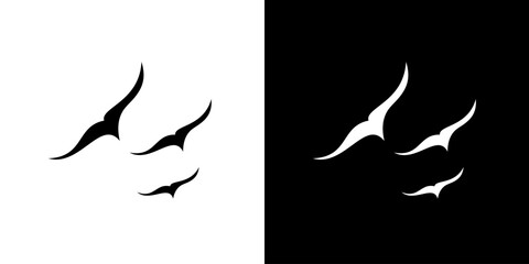 Flock flying birds vector silhouette illustration