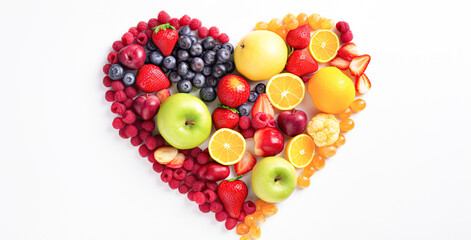 Wall Mural - A heart made of fruit including apples, oranges, and strawberries