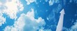 © Stock Spectrum - Arrow pointing upward in blue sky, symbolizing business success and career advancement.