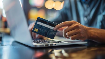 Aufkleber - A person working on their laptop while holding a credit card, possibly making an online payment or transaction