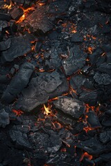 Aufkleber - A close-up view of a pile of coal with flames burning bright