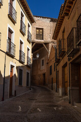 Naklejka na meble Doncellas street in the UNESCO World Heritage site of the city of Toledo since Valley lookout in a sunny day. Castilla la Mancha, Spain.