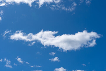 Wall Mural - white fluffy clouds isolated on a black background