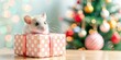 © Naeem - Adorable Little Mouse attempting to unwrap Christmas present