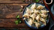 © AkuAku - Freshly Boiled Dumplings Traditional Chinese Cuisine on Vintage Wooden Surface