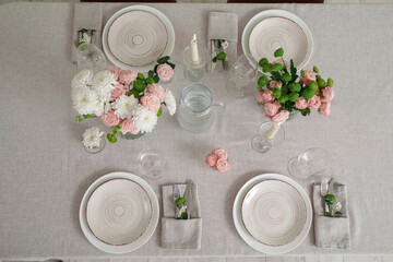 Wall Mural - Festive table setting for wedding with beautiful flowers in dining room. Top view