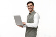 © Oksana_Latysheva - Portrait of young modern businessman standing holding laptop isolated on white background