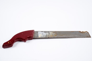 an old wood saw on an isolated white background.