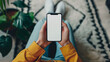 © KEA - Mockup woman's hand holding using smart phone with white blank screen POV  at coffee shop, mobile app design and advertising, online marketing