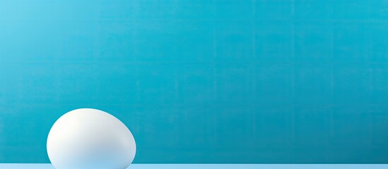 Poster - White egg shell on bright blue background Minimal Easter concept. copy space available