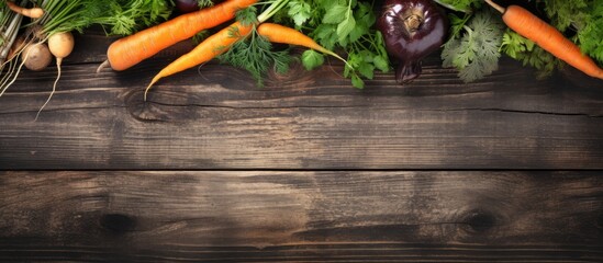 Poster - Raw natural food background Vegetables carrot top view on old wooden desk background Photograph taken from above with dirt soil vintage planks Vintage gardening concept with copy space