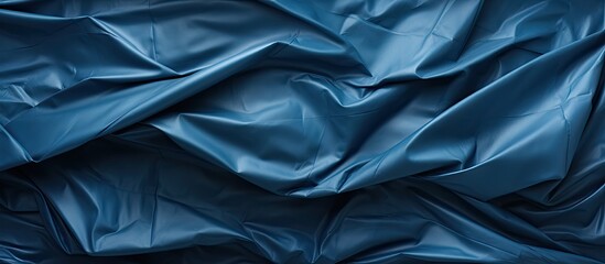 Poster - blue crumpled paper texture background. copy space available