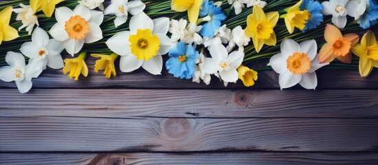 Aufkleber - Beautiful blue flowers yellow and white daffodils on a wooden background Copy space