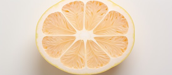 Poster - Ripe cut pomelo and peel on light background with space for text top view. copy space available