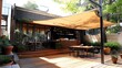 © nitiroj - Elegant cantilever pole supporting a large shade sail in a contemporary outdoor cafe setting