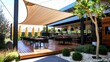 © nitiroj - Elegant cantilever pole supporting a large shade sail in a contemporary outdoor cafe setting
