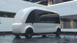 © Oleksandr - A futuristic electric delivery van with an all-white exterior and large windows
