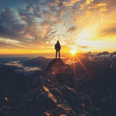 silhouette of a person on the top of the mountain motivation of success