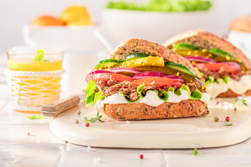 Wall Mural - Healthy sandwich served with lemonade in the kitchen.