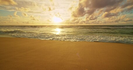 Wall Mural - Sunset or sunrise light over sea waves in beautiful Tropical seashore in Phuket Thailand