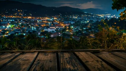 Wall Mural - City at night with wooden platform in foreground