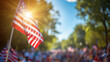 © Pattra - The American flag on a bright sunny day at a crowded Fourth of July parade.